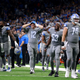 The Detroit Lions celebrate after defeating the Minnesota Vikings 29-27 at Ford Field on December 05, 2021 in Detroit, Michigan. (Photo by /Getty Images)